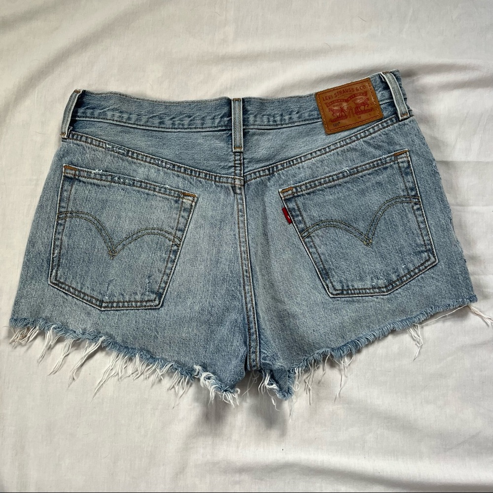Levi Distressed Buttonfly Cutoffs - image 5